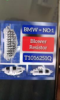 A display board showing a BMW blower resistor part with its part number