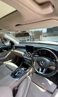 The interior of a Mercedes-Benz GLC showing the dashboard, steering wheel and centre console
